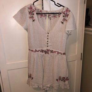 White Romper with flower detailing